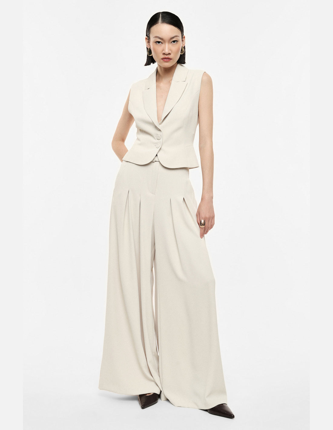 Pantalon palazzo taille haute ceinturé écru – Imperial Femme, porté