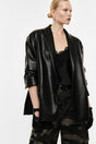 Blazer oversize en cuir synthétique porté de face – Noir – Imperial Femme
