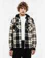 Blouson zippé à carreaux, porté de face