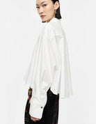 Chemise courte ample en coton à maxi poignets – blanc – Imperial Femme