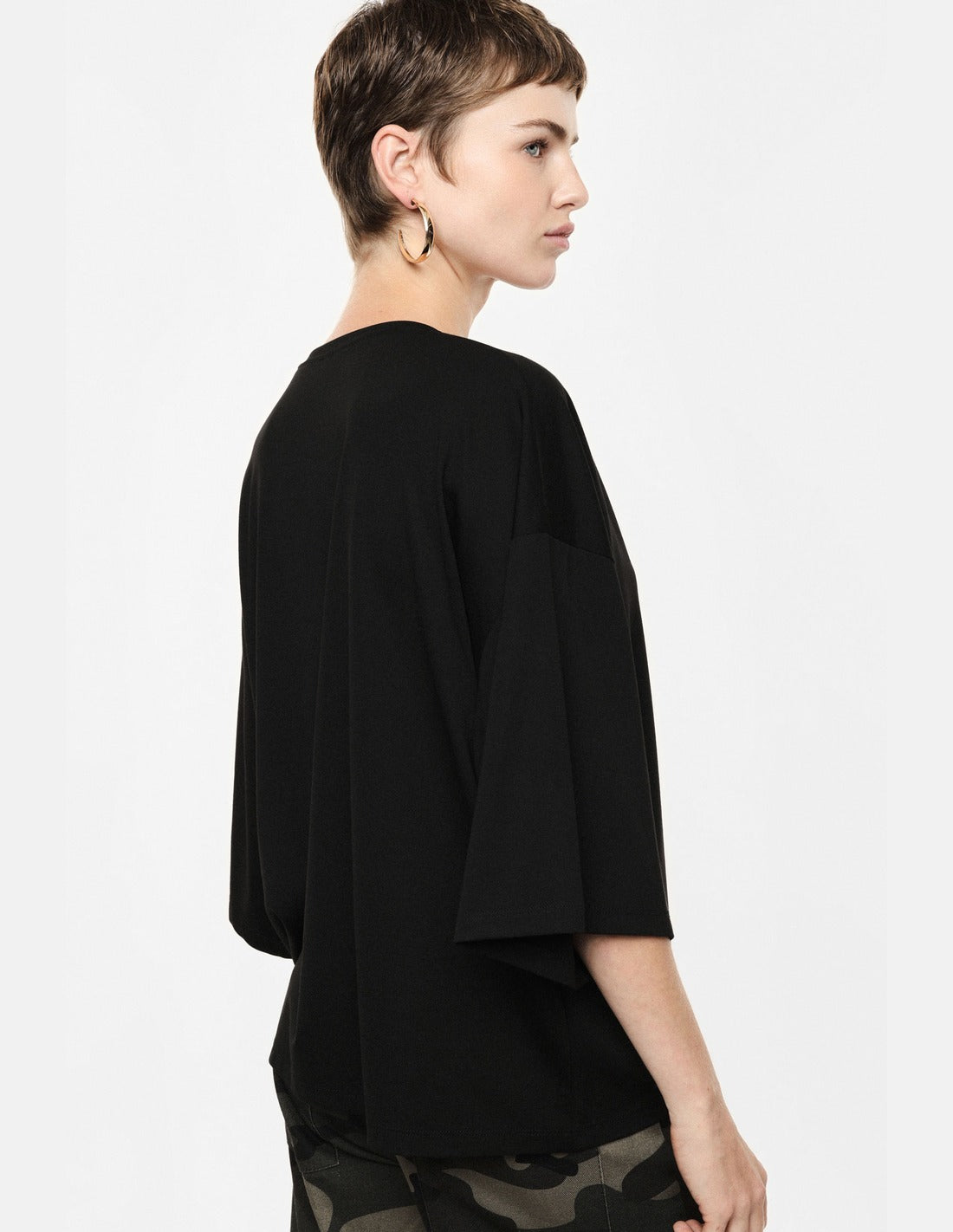 Top ample manches chauve-souris col V porté, dos – Noir – Imperial Femme