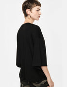 Top ample manches chauve-souris col V porté, dos – Noir – Imperial Femme