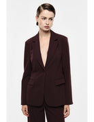 Blazer dos plissé à chaîne métallique en draperie – Imperial Femme