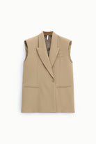 Gilet long sans manches col à revers effet cape beige – Imperial Femme