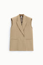 Gilet long sans manches col à revers effet cape beige – Imperial Femme