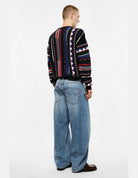 Jean baggy délavé clair, bleu denim, porté de dos