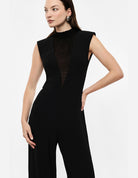 Combinaison col montant en crêpe fluide portée, détail du tulle – Imperial Femme
