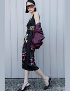 Jupe midi patchwork imprimée portée, en mouvement – Imperial Femme