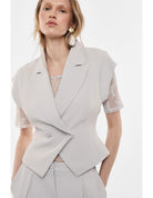 Veste sans manches col revers croisée – Imperial Femme